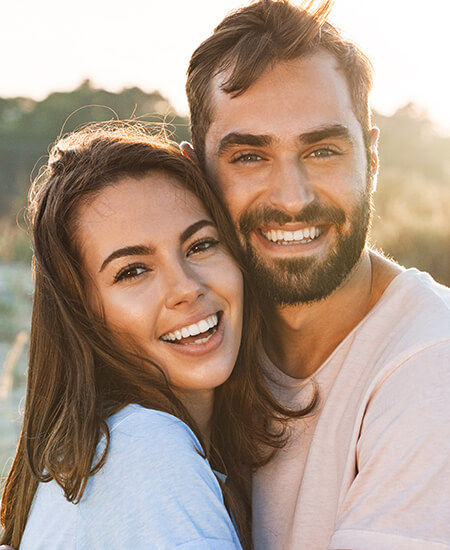 A young couple smiling together